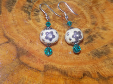 Beaded earrings with crystals